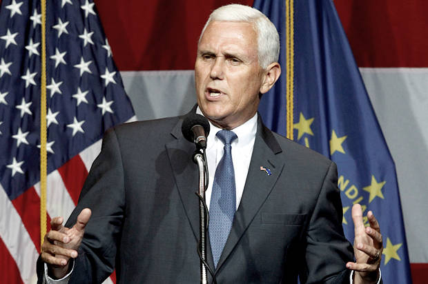 Indiana Governor Mike Pence addresses the crowd before Republican presidential candidate Donald Trump took the stage during a campaign stop at the Grand Park Events Center in Westfield